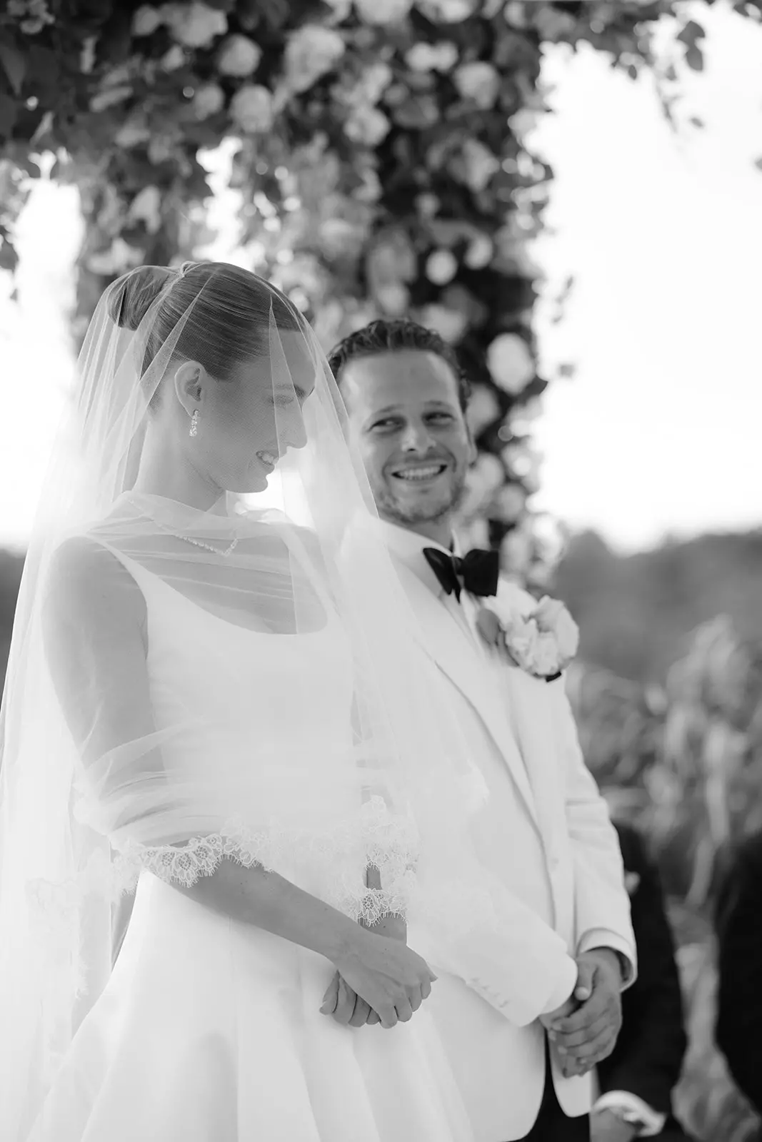 Bride and groom during religious ceremony with timeless bridal beauty styling