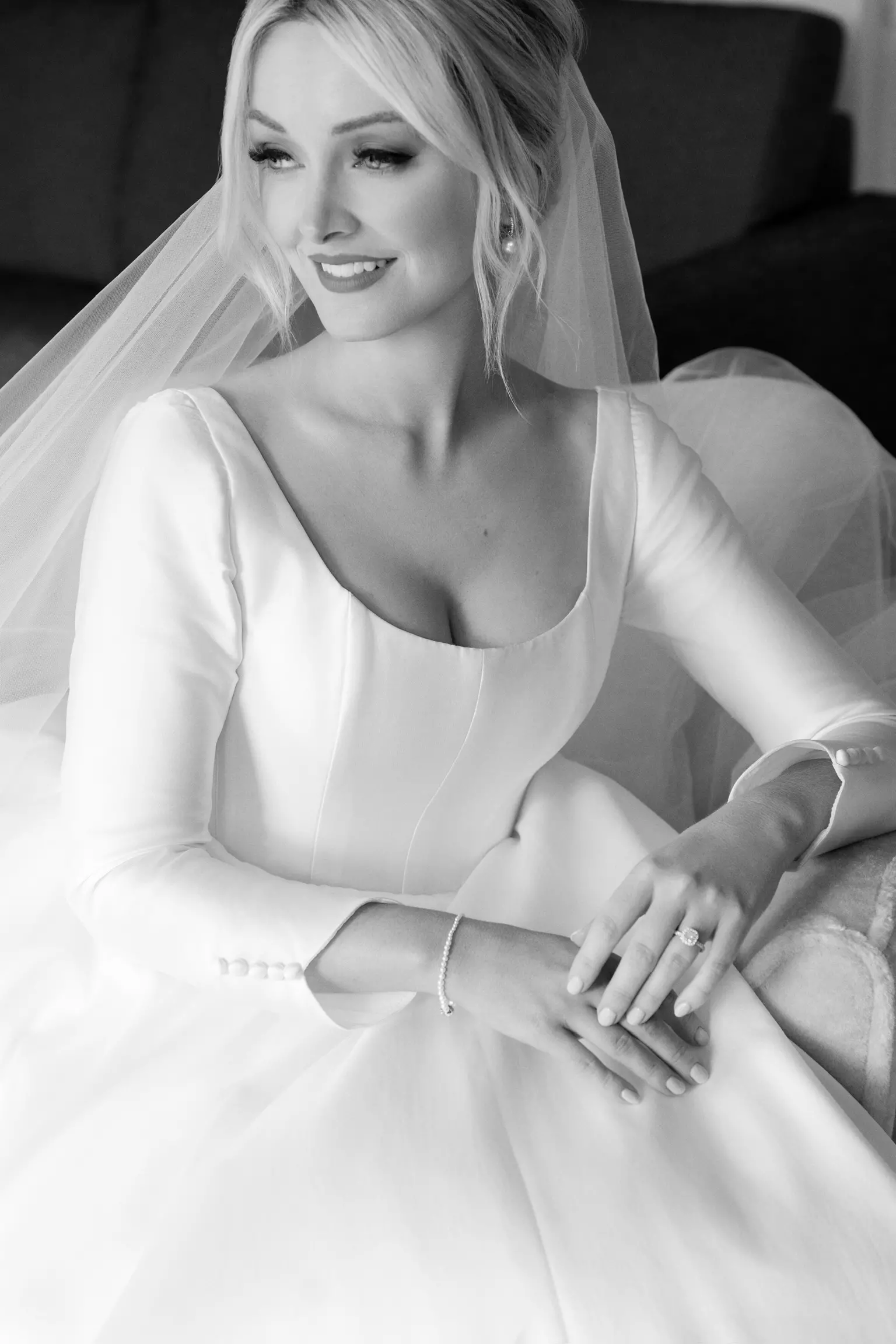 Close up of bride Katherine showcasing intentional bridal makeup and elegant hairstyle by Mandy Dorian