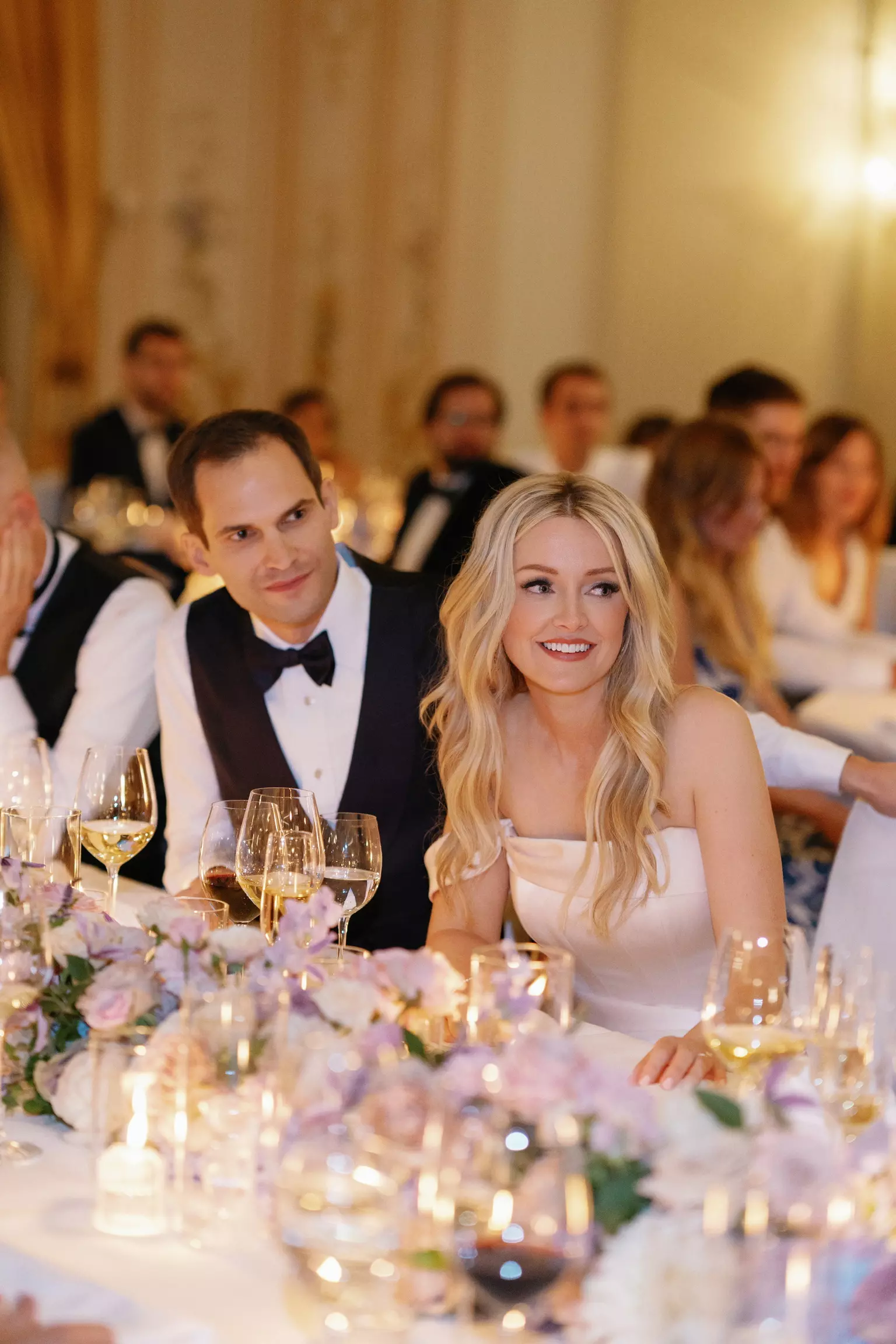 Bride during reception wearing second bridal beauty look created for multi day wedding celebration