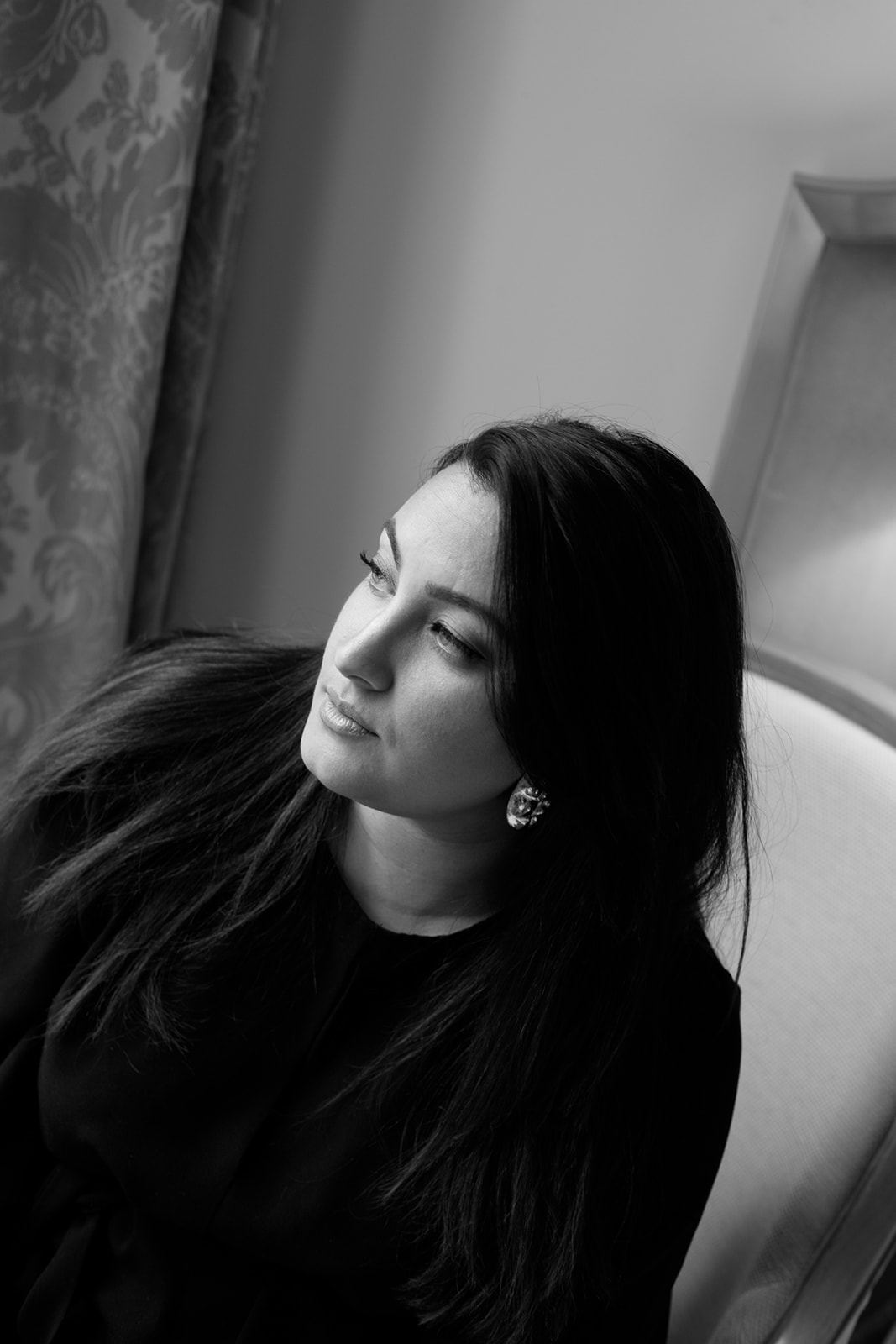 Black and white portrait of Mandy Dorian luxury bridal hair and makeup artist in France